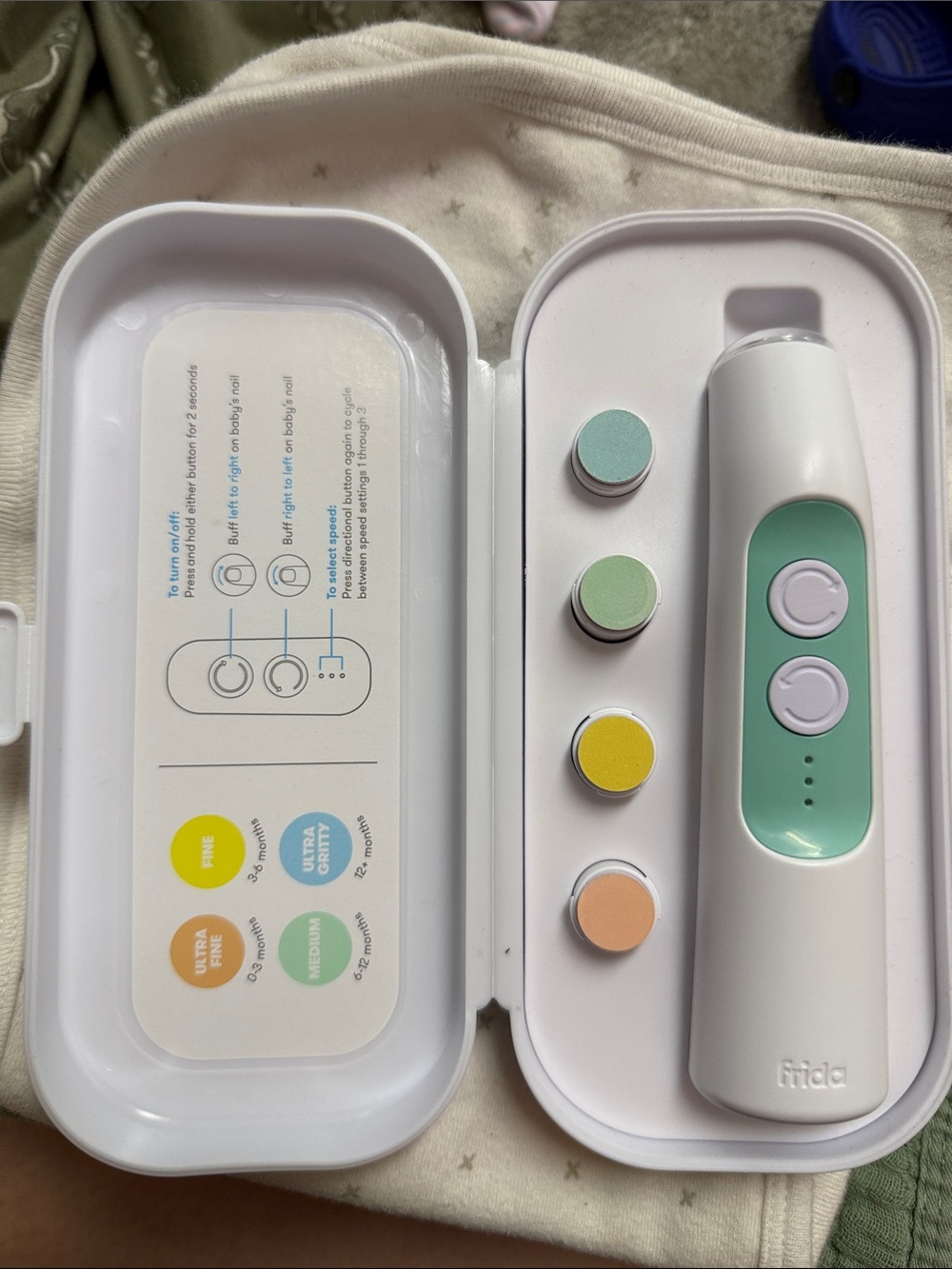 Frida Baby Electric Nail Trimmer in Mint/White
